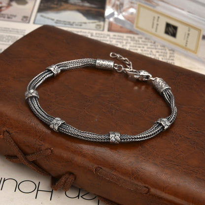 Aurenix – Twin Serpent Silver Bracelet