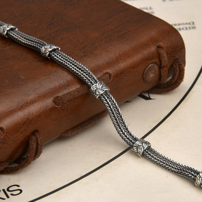 Aurenix – Twin Serpent Silver Bracelet